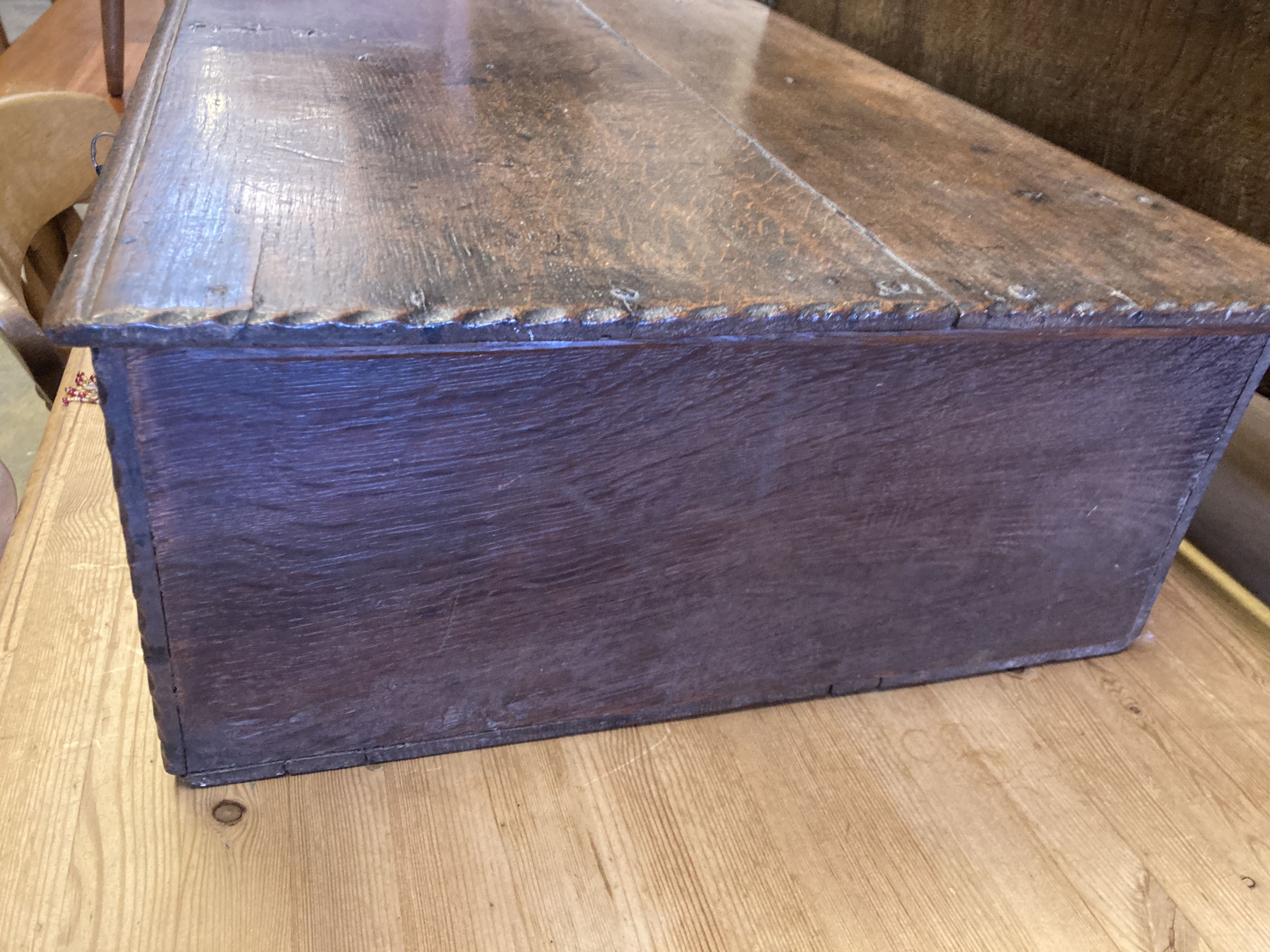 An 18th century oak bible box of plain rectangular form, width 74cm, depth 48cm, height 21cm